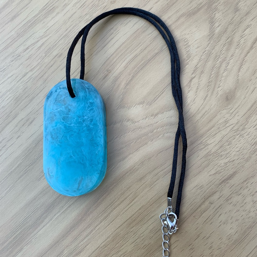 Beautiful handcrafted resin oval necklace